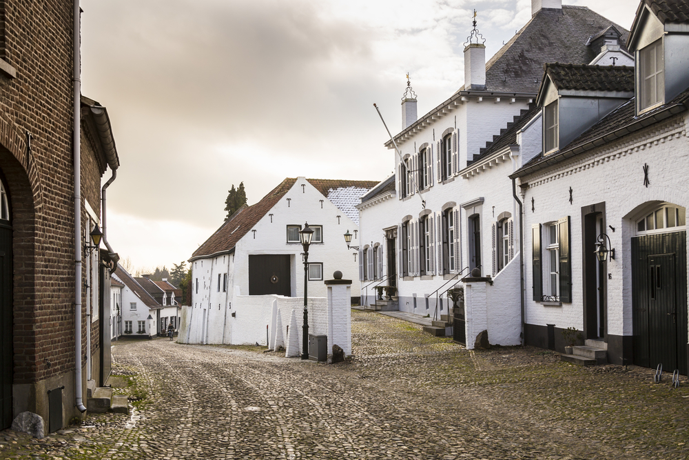 photo-of-one-of-authentic-dutch-villages-thoorn-with-white-houses-pretty-streets