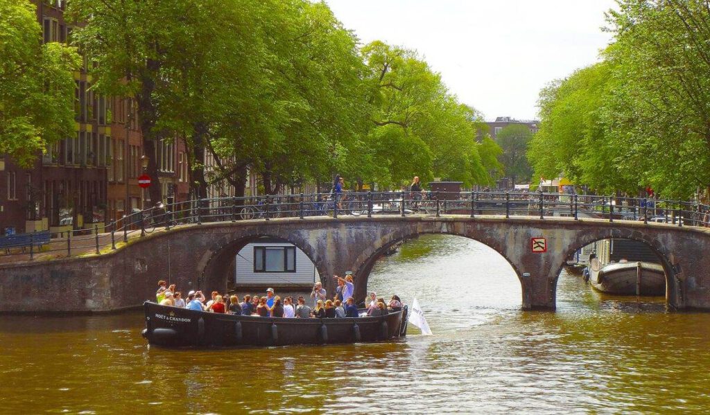 A-boat-tour-on-a-canal-in-Amsterdam