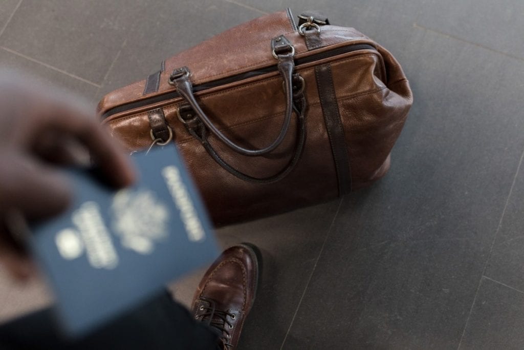 photo-of-bag-passport-person-leaving-after-deregistering-in-the-netherlands