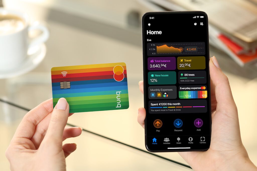 photo-of-hand-holding-dutch-bank-bunq-card-and-phone-with-bunq-app