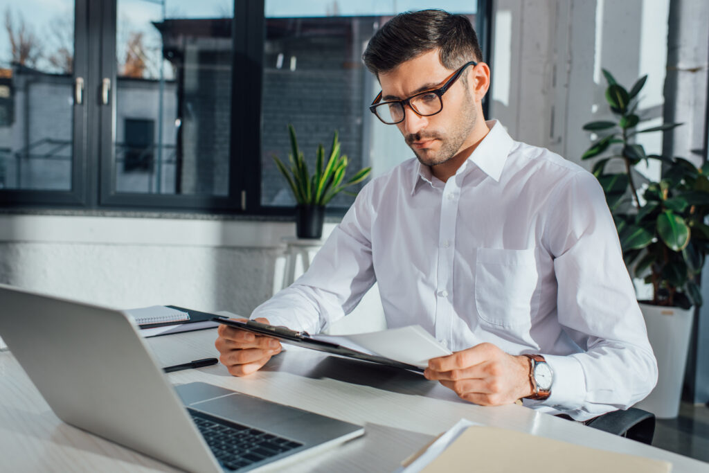 businessman-opening-dutch-bank-account-with-paperwork-he-requires-for-a-bv