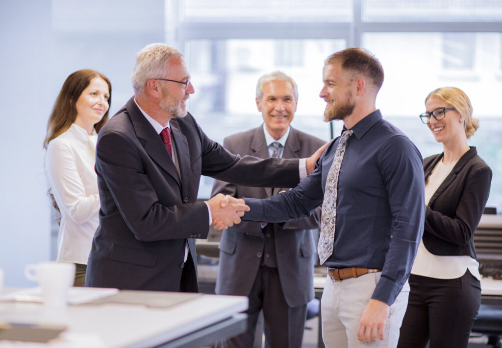 businessmen-shaking-hands-in-the-netherlands-as-new-employee-joins-bv-private-limited-company
