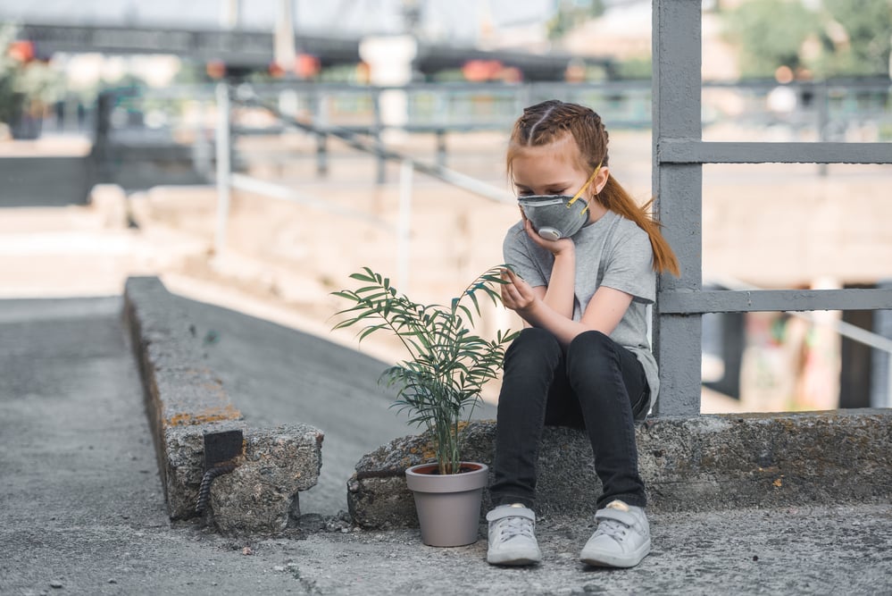 child-in-polluted-city-with-dying-plant-nitrogen-crisis-the-netherlands