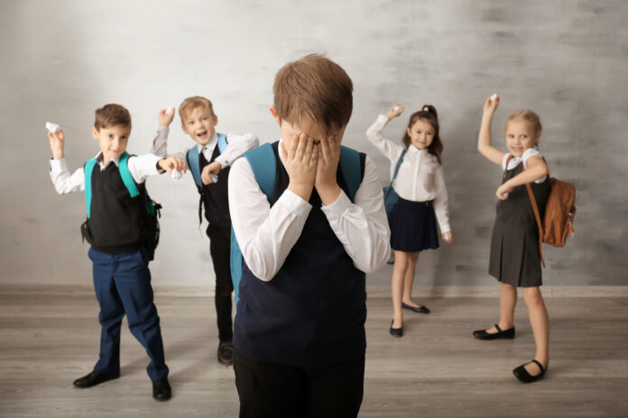 stressed-child-being-bullied-by-classmates