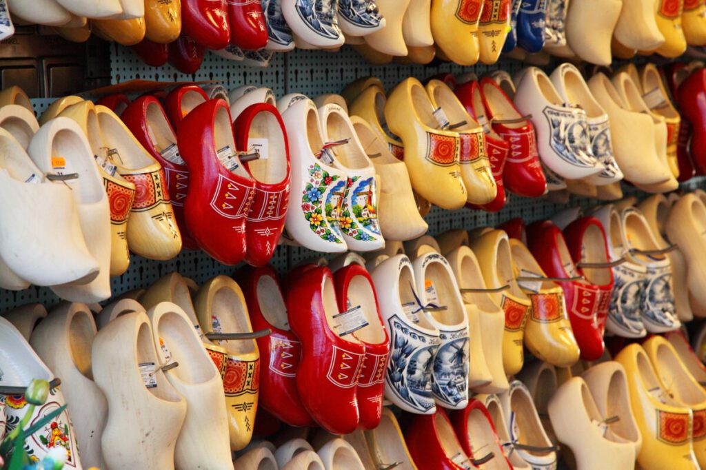 Red wooden shoes. Dutch wooden clogs in the color red