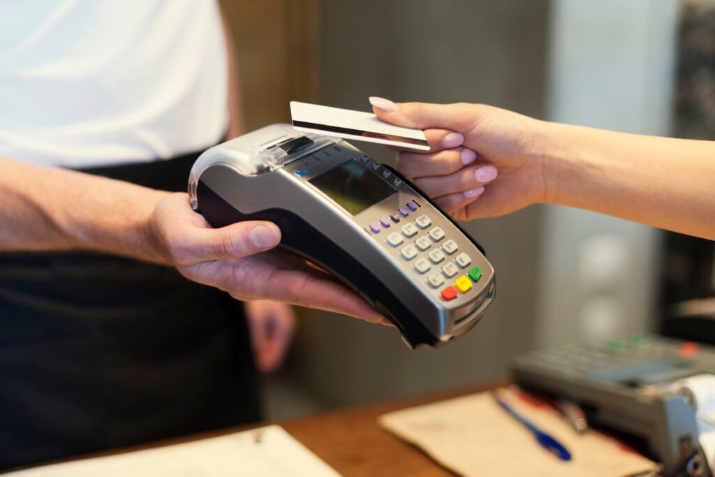 Close-up-of-customer-paying-by-credit-card-contactless-payment-in-the-Netherlands