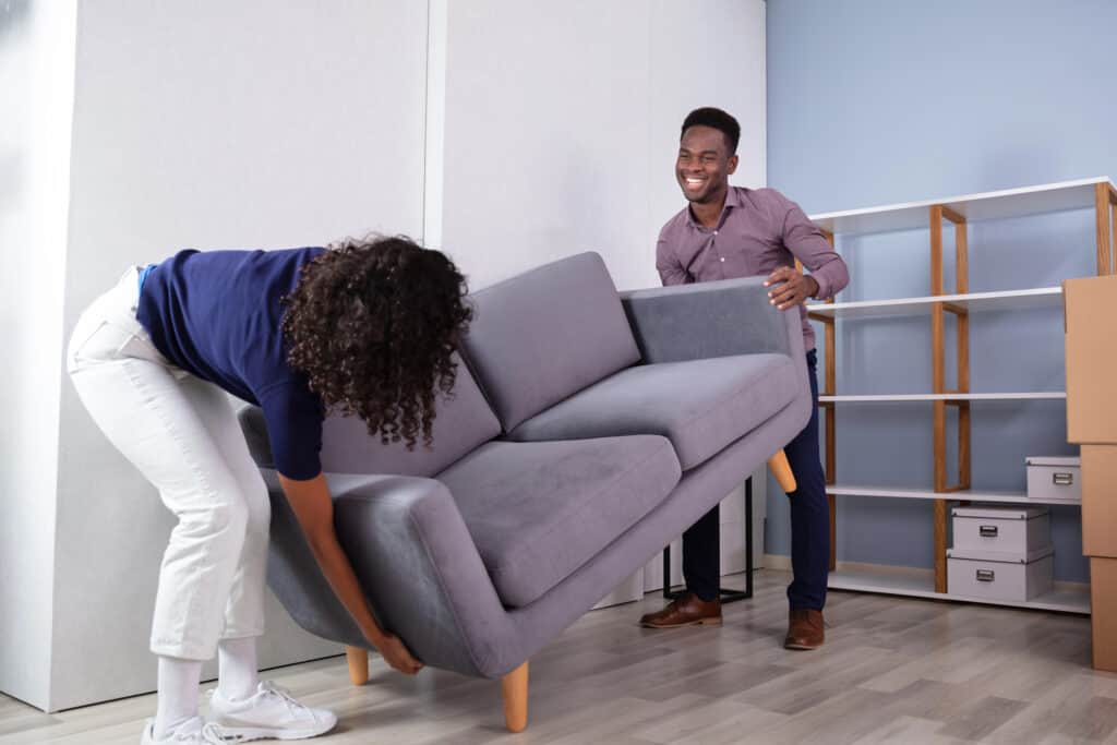 couple-moving-facebook-marketplace-find-into-new-home