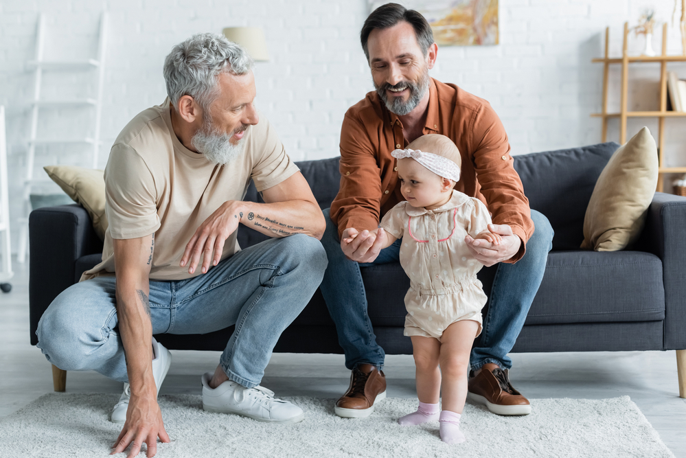 Photo-of-couple-with-toddler-sitting-on-couch-in-house-Netherlands