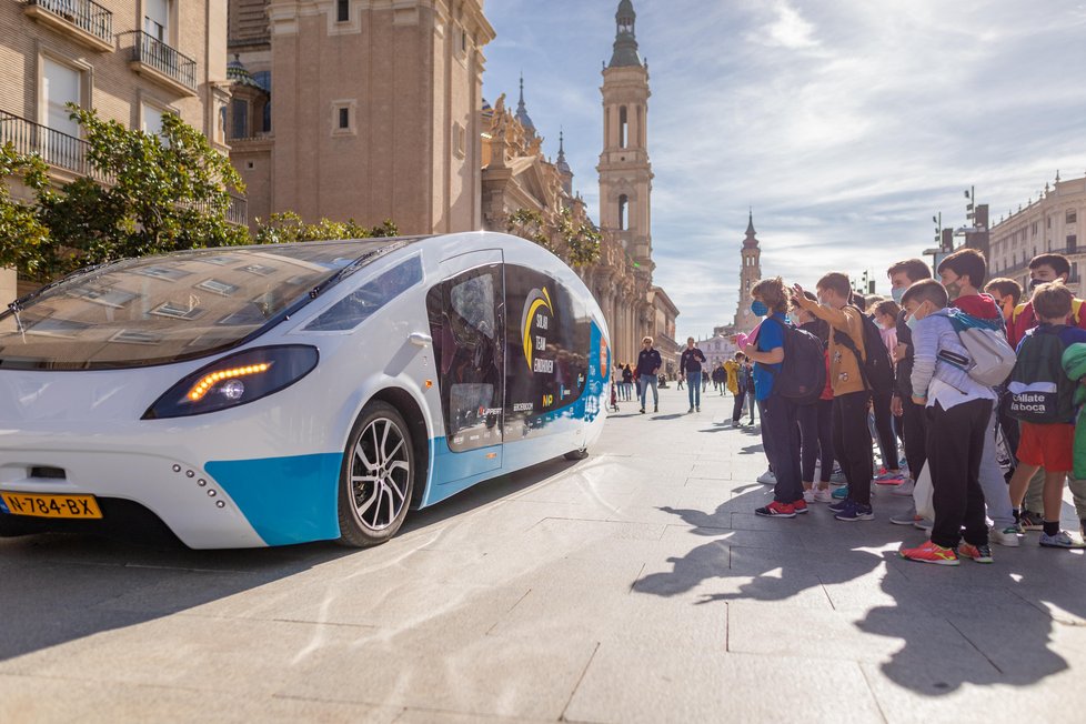 Photo-of-people-taking-pictures-of-solar-powered-campervan-Stella-Vita