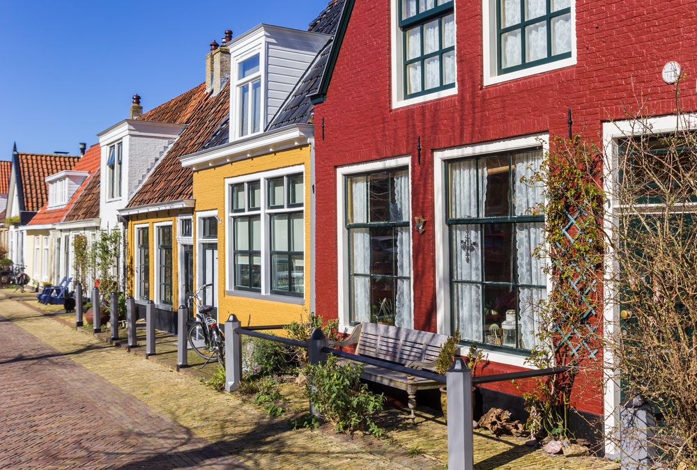 Colourful-Dutch-houses-with-curtains-open-in-the-netherlands