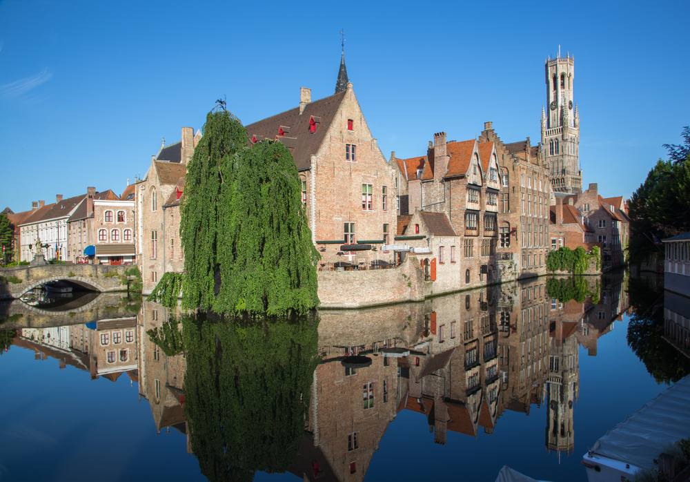 photo-of-historical-buildings-of-bruges-reflecting-in-the-reie-river