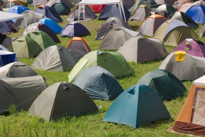 photo-of-tents-at-a-campsite-in-an-outdoor-music-festival