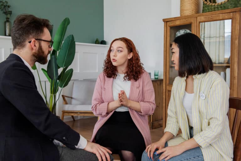 photo-of-couple-sitting-down-with-mediator-to-discuss-separating-in-the-Netherlands