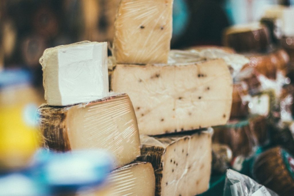 cheese at a market stall