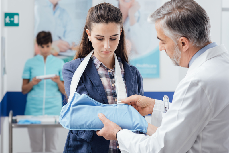 dutch-doctor-caring-for-a-patient-with-a-broken-arm-at-hospital-in-the-netherlands