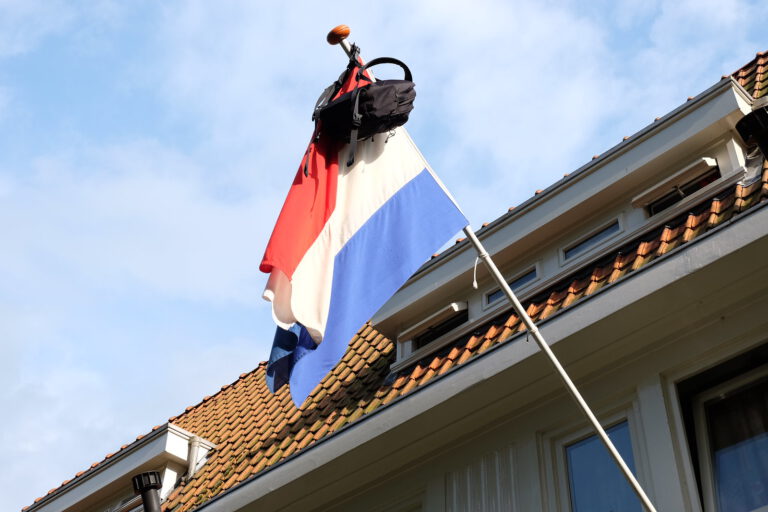 Dutch Quirk #88: Hang their school backpack on their house flagpole after graduating