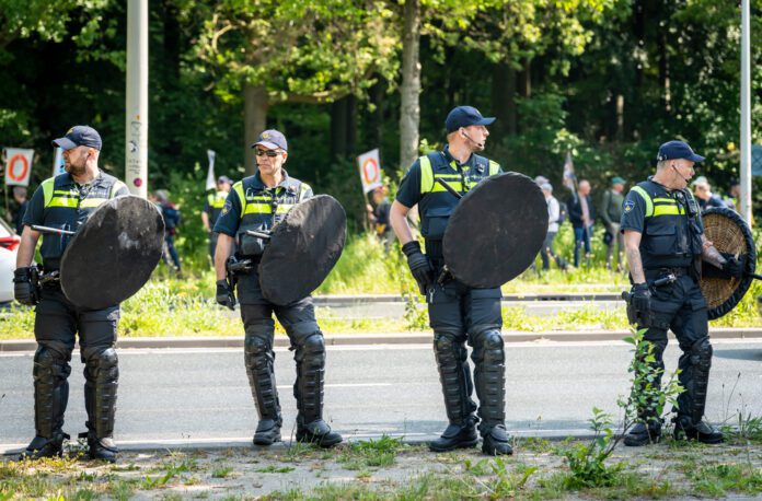 four-dutch-police-officers-at-protest