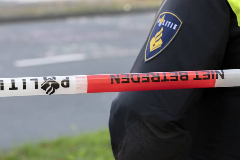 dutch-police-officer-standing-in-front-of-police-tape-after-deadly-incident-in-the-netherlands