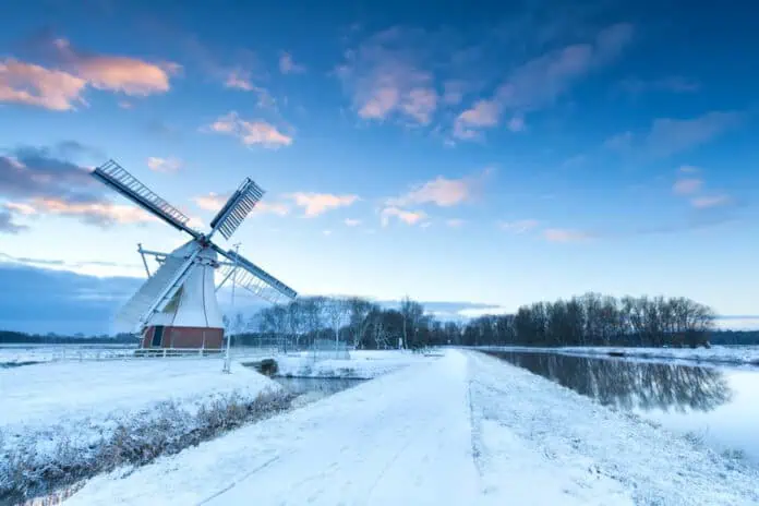 photo-of-dutch-windmill-covered-in-snow