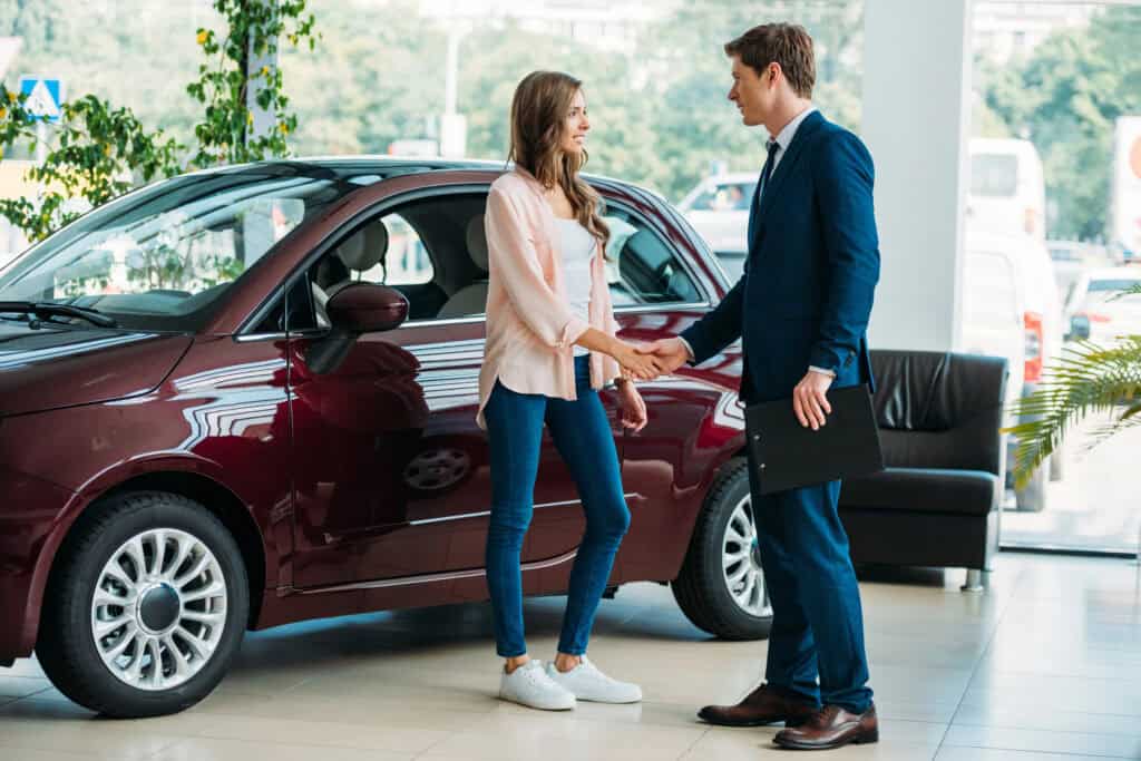 dutch-woman-buying-a-car-after-saving-money-in-the-netherlands