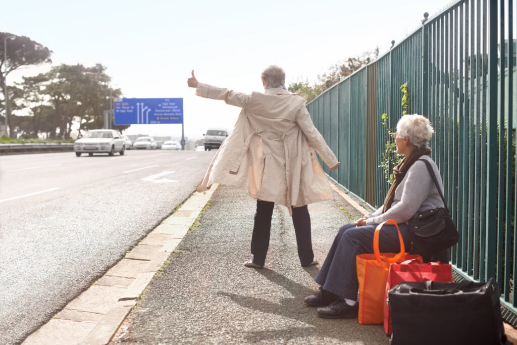 elderly-couple-dressed-nicely-hitchhiking-their-way-around-europe
