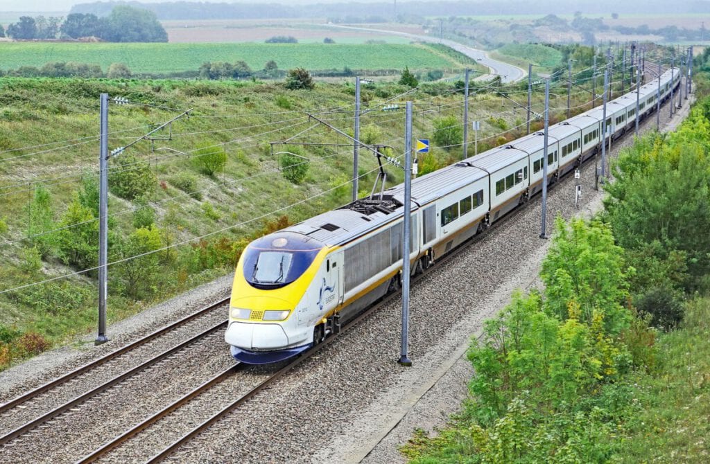 photo-of-eurostar-train-with-green-nature-surroundings