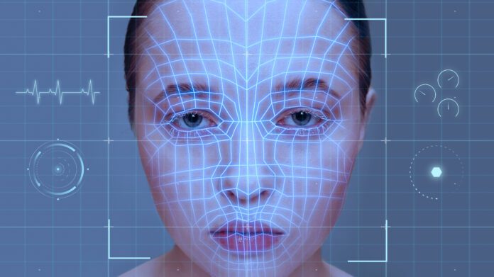 facial-scan-with-blue-light-across-young-womans-face