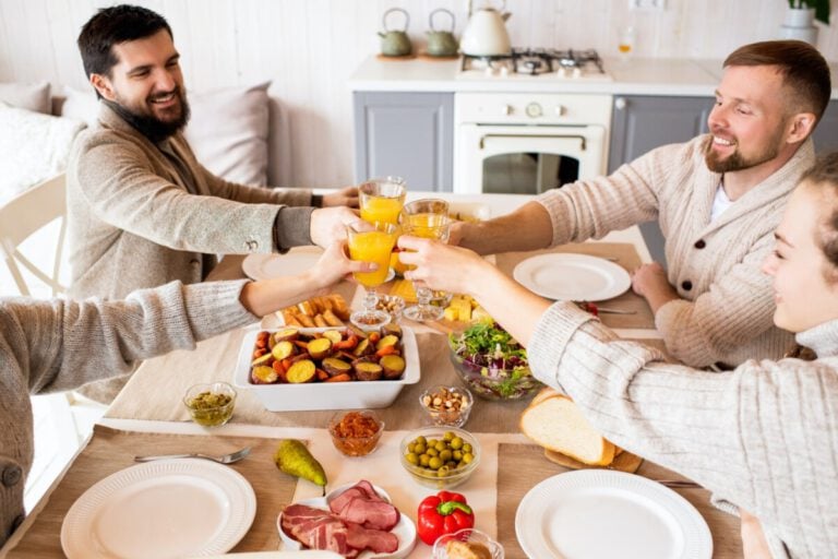 photo-of-four-expats-in-the-netherlands-cheering-at-brunch