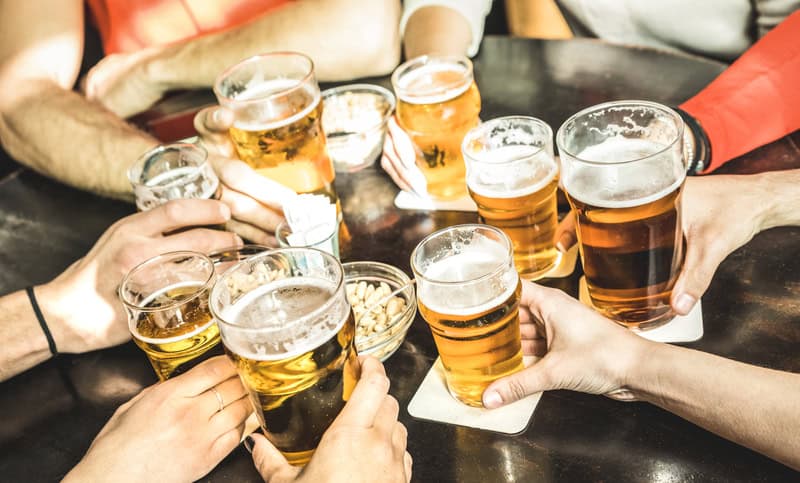friends-or-coworkers-attending-a-borrel-in-the-netherlands-holding-beer