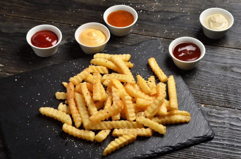 Dutch Quirk #137: Eat fried snacks off a table wrapped in clingfilm