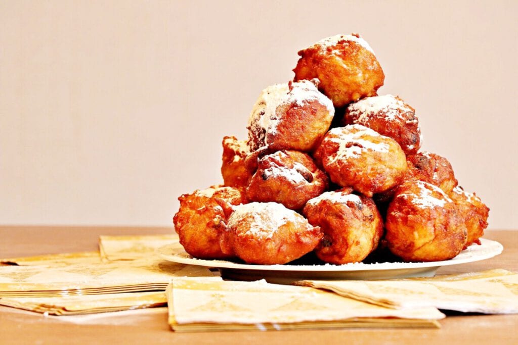 photo-of-dutch-oliebollen-stacked-on-plate