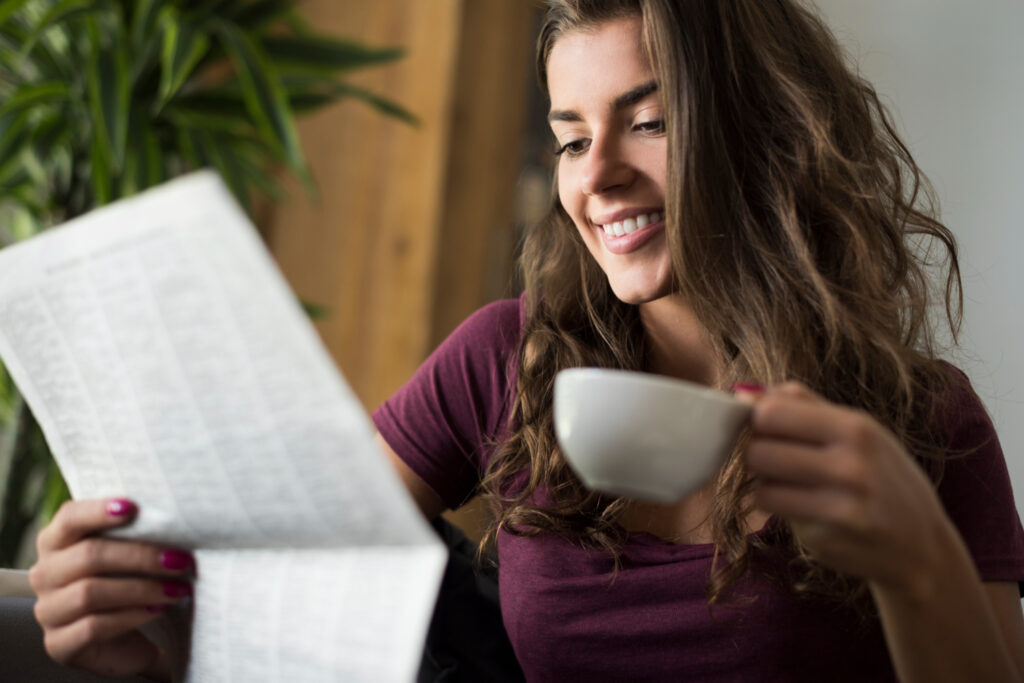 photo-of-woman-looking-happy-at-letter