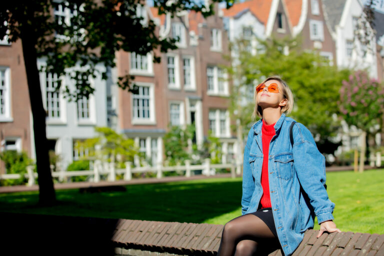 photo-of-girl-sitting-in-sun-after-moving-to-amsterdam