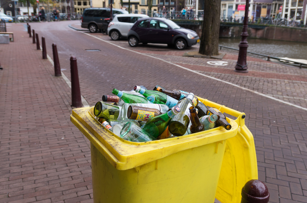 Glass-bottle-bin-in-front-of-a-house-for-recycling-in-the-netherlands