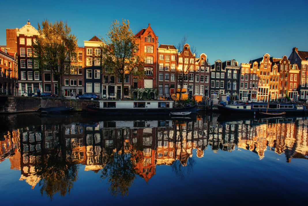 A row of dutch houses amidst golden hour