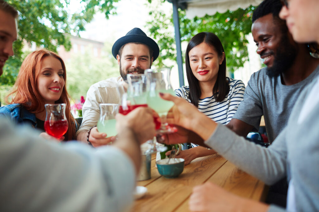 group-of-friends-having-drinks-outdoors-in-the-netherlands-saving-money-by-not-paying-for-everyone