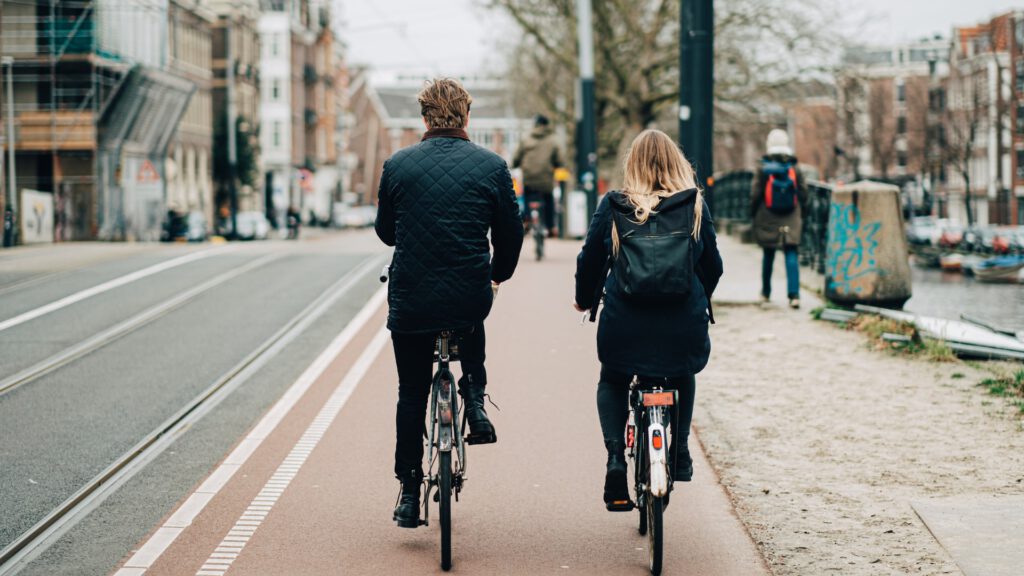 photo-of-a-couple-cycling-on-a-dutch-bicycle-lane
