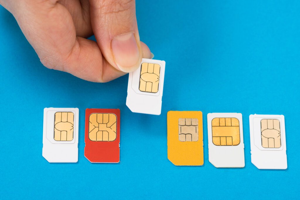 hand-picking-up-sim-card-for-mobile-internet-in-the-netherlands