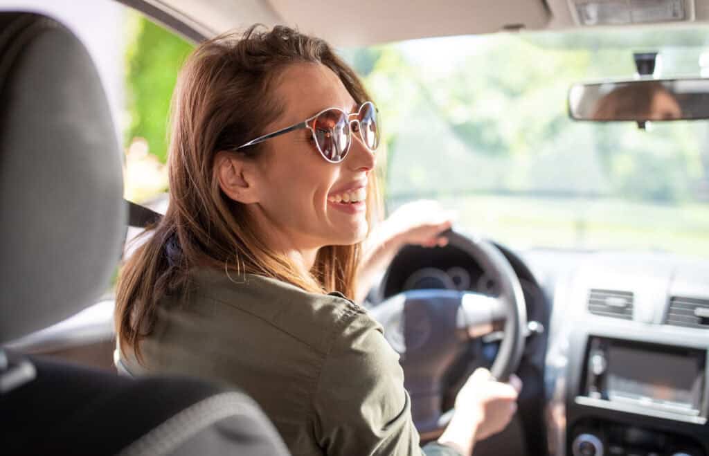 happy-woman-in-new-second-hand-car-in-the-netherlands