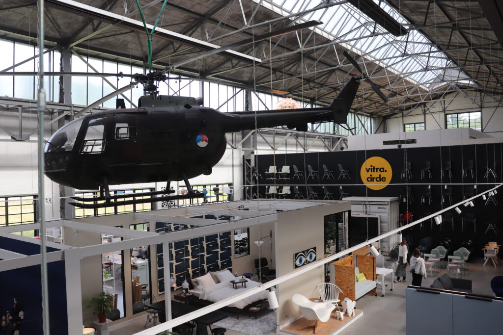 photo-of-helicopter-hanging-from-ceiling-at-vitra-circle-furniture-store-at-the-hembrug-in-zaandam