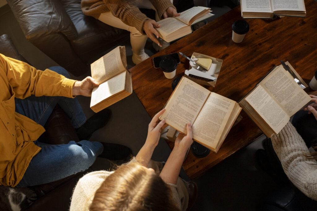 high-angle-people-reading-bible-together-dutch-bible-belt