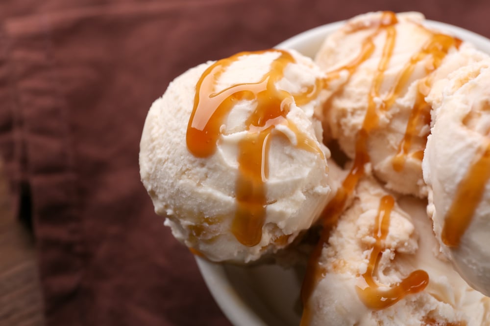 photo-of-ice-cream-with-caramel-sauce-in-bowl