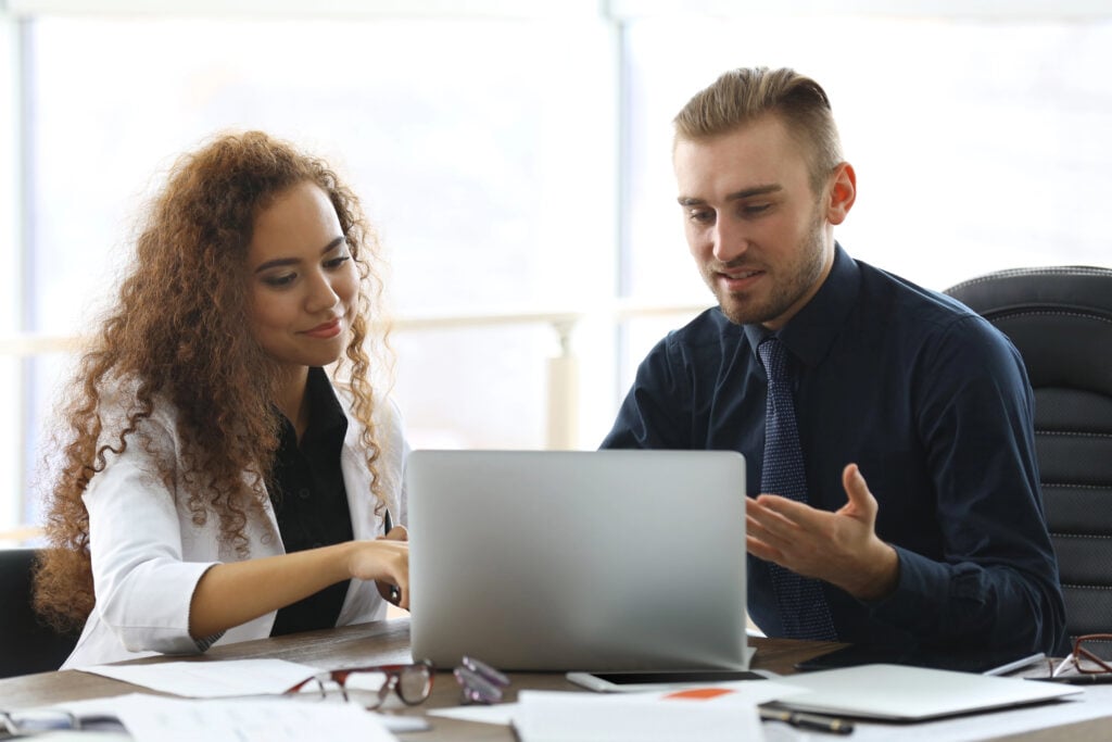 international-employee-with-female-supervisor-working-together-slowly-reintegrating-after-mental-health-incident