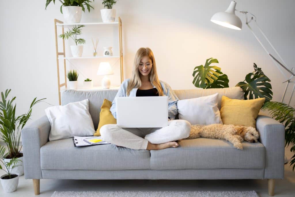 international-in-the-netherlands-working-from-home-on-laptop-thanks-to-remote-friendly-four-hour-work-week