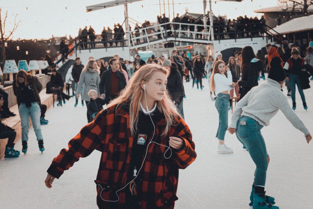 photo-of-girl-ice-skating-at-dam-square-amsterdam-rink