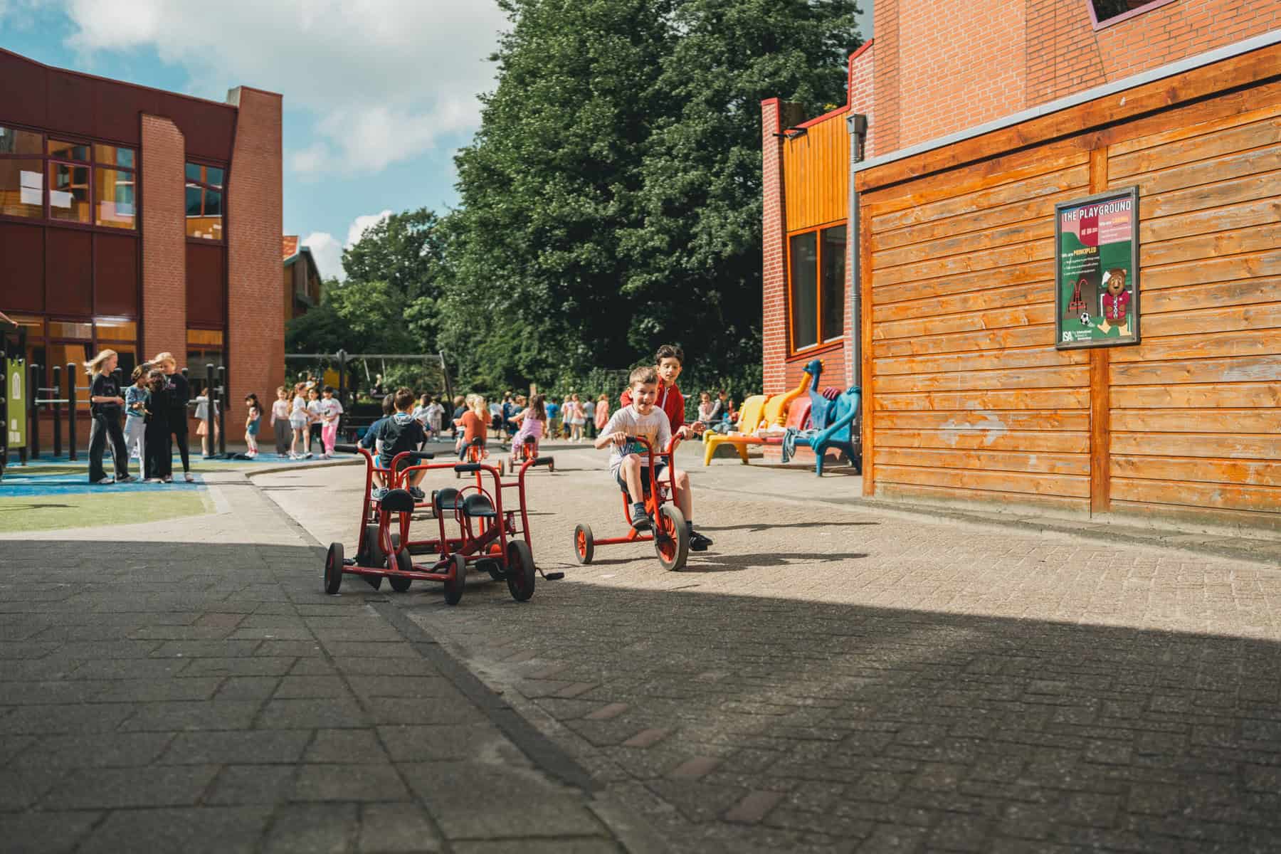 children playing in the school playground of isa