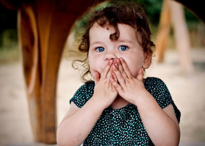 Girl-with-hand-over-her-mouth-Dutch-directness