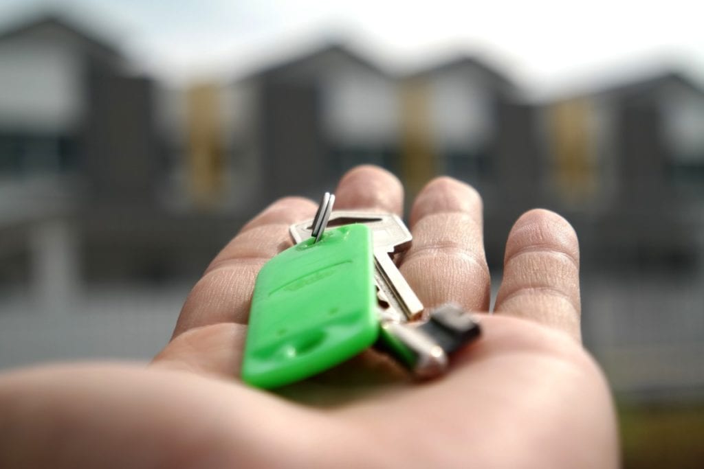 Photo-of-hand-holding-house-keys-after-renting-a-house-in-the-Netherlands