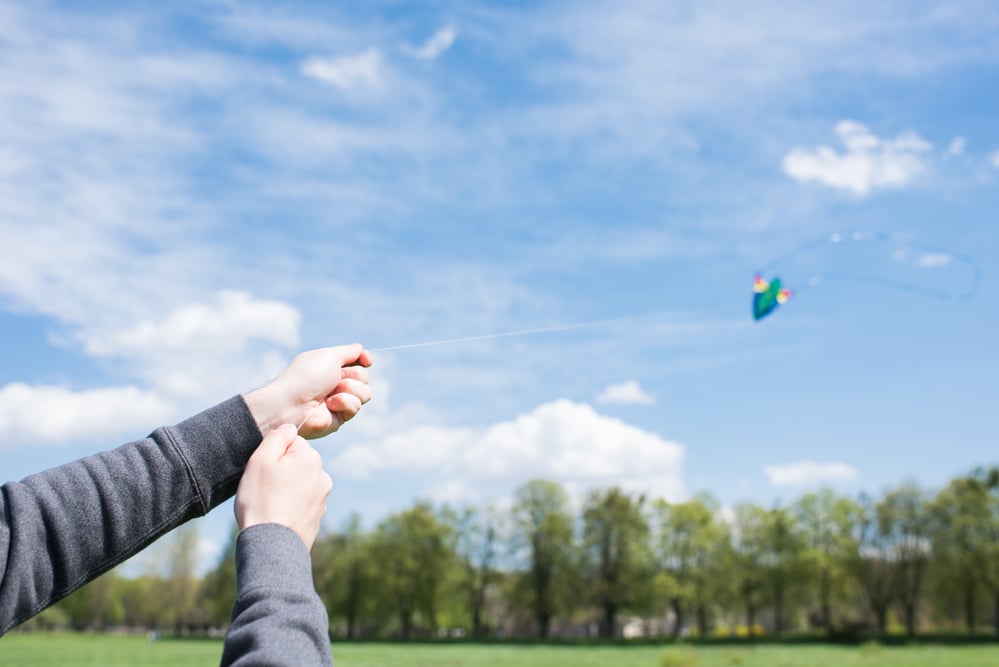 photo-of-man-with-kite-to-produce-green-energy-in-the-Netherlands