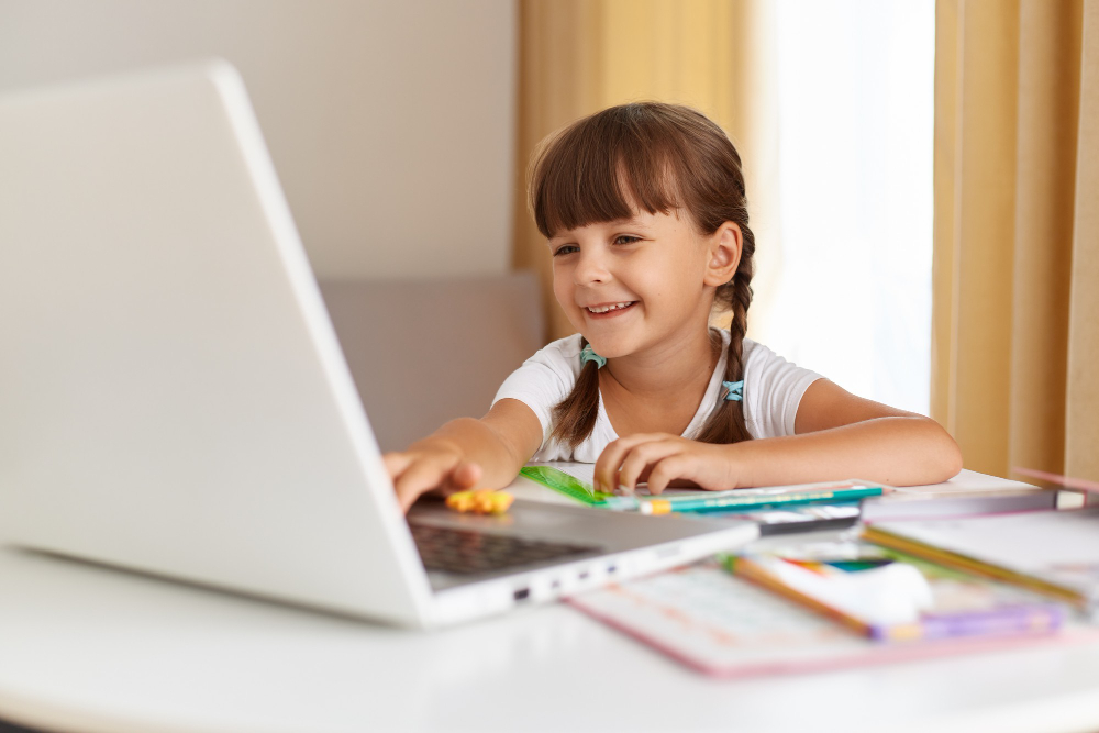 photo-of-young-girl-learning-at-home